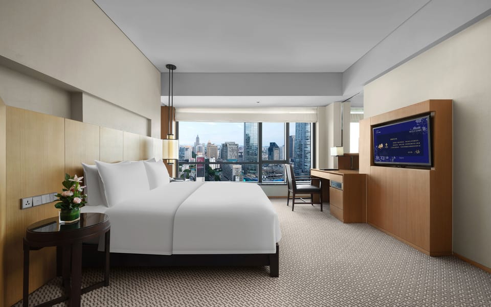 Premium bedding, down comforters, minibar, in-room safe