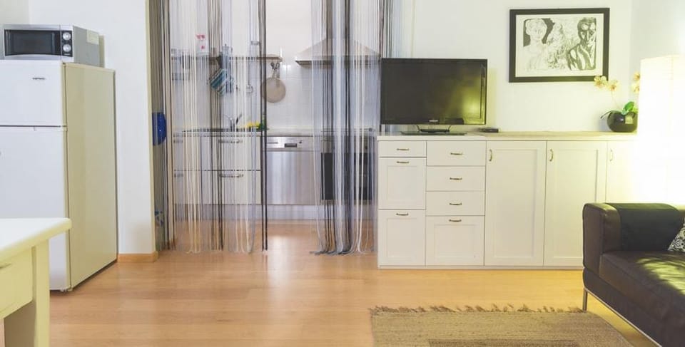 City Apartment, 2 Bedrooms | Living area | TV