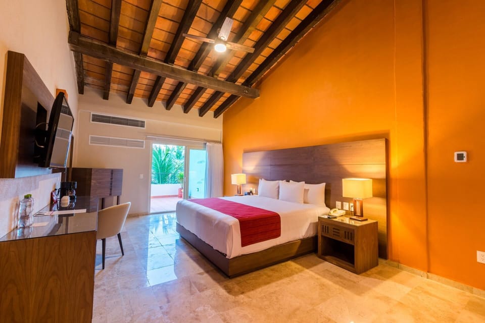 Family Suite | Free minibar, in-room safe, blackout drapes, iron/ironing board
