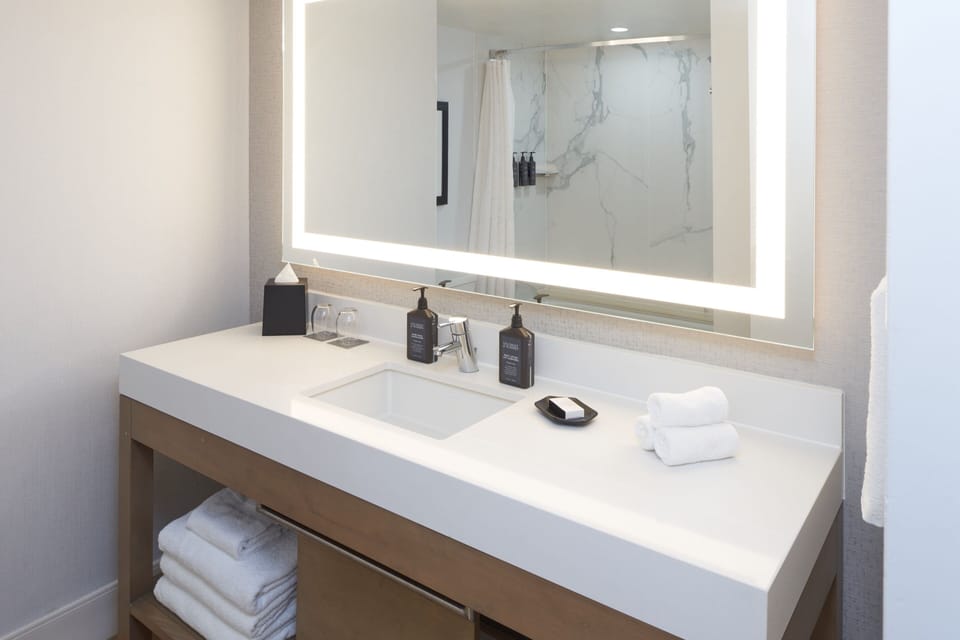 Combined shower/tub, eco-friendly toiletries, hair dryer, towels