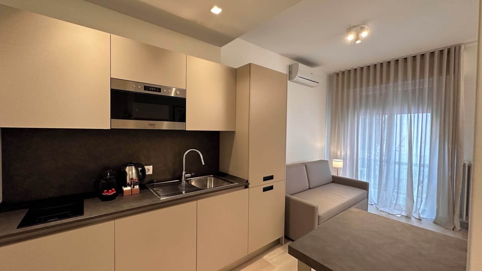 Studio, 1 Bedroom (Aparthotel) | Private kitchen | Full-size fridge, microwave, oven, stovetop