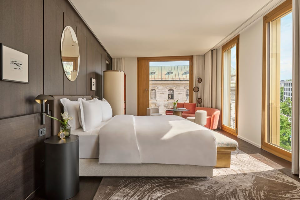 Premium bedding, down comforters, pillowtop beds, free minibar