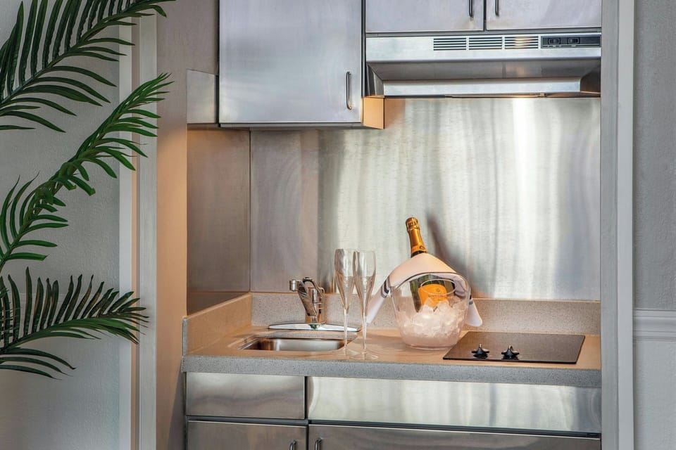 Suite, 1 King Bed with Sofa bed | Private kitchen | Fridge, coffee/tea maker