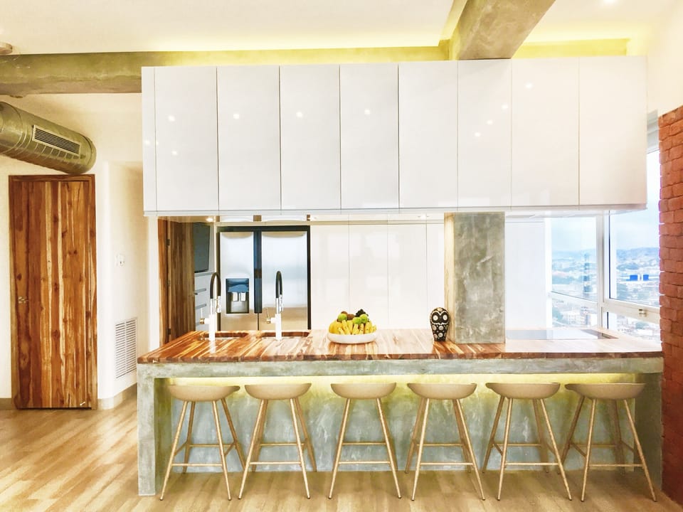Grand Apartment, 2 Bedrooms, River View | Private kitchen | Coffee/tea maker, full-size fridge, microwave, oven