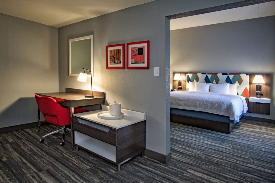 Suite, 1 King Bed, Non Smoking | Iron/ironing board, free cribs/infant beds, free WiFi, bed sheets