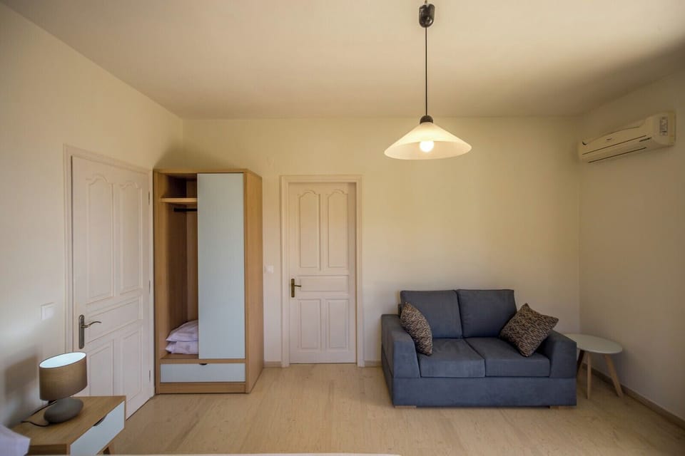 Family Apartment, 2 Bedrooms, Sea View | Iron/ironing board, free WiFi