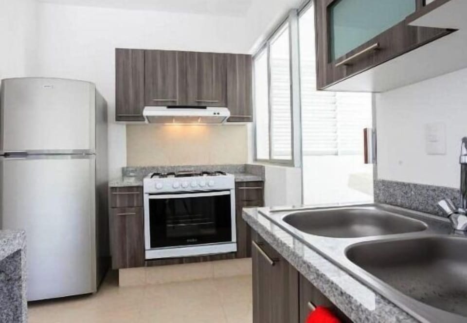 Family Condo, 2 Bedrooms | Private kitchen | Full-size fridge, microwave, oven, stovetop