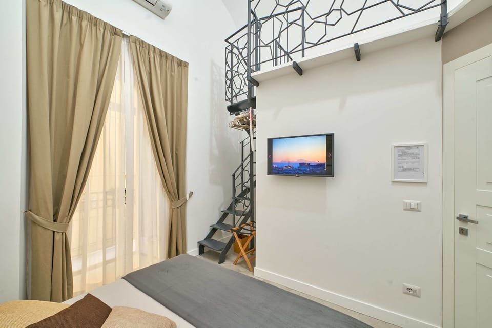 Gallery Duplex, Multiple Beds, Balcony | Room amenity