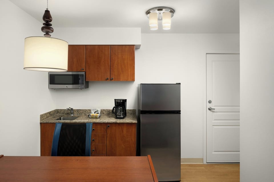 Studio, 1 Queen Bed with Sofa bed | Private kitchen | Fridge, microwave, stovetop, dishwasher