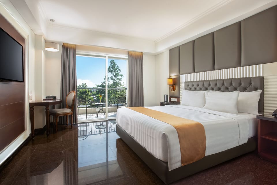 Deluxe Room, 1 Double Bed, Balcony | 1 bedroom, in-room safe, soundproofing, free WiFi