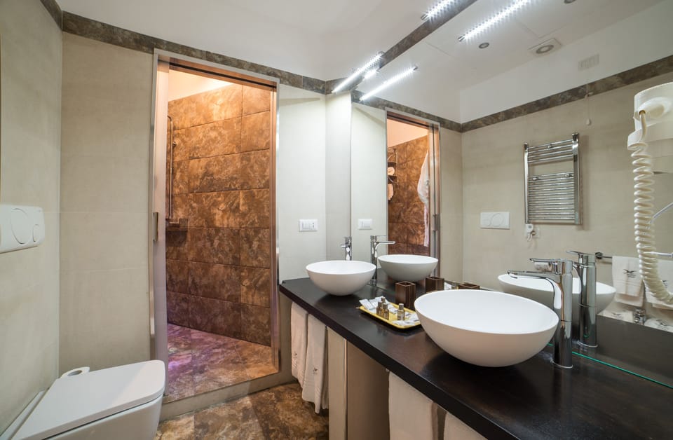 Junior Suite, Multiple Beds | Bathroom | Shower, free toiletries, hair dryer, bidet
