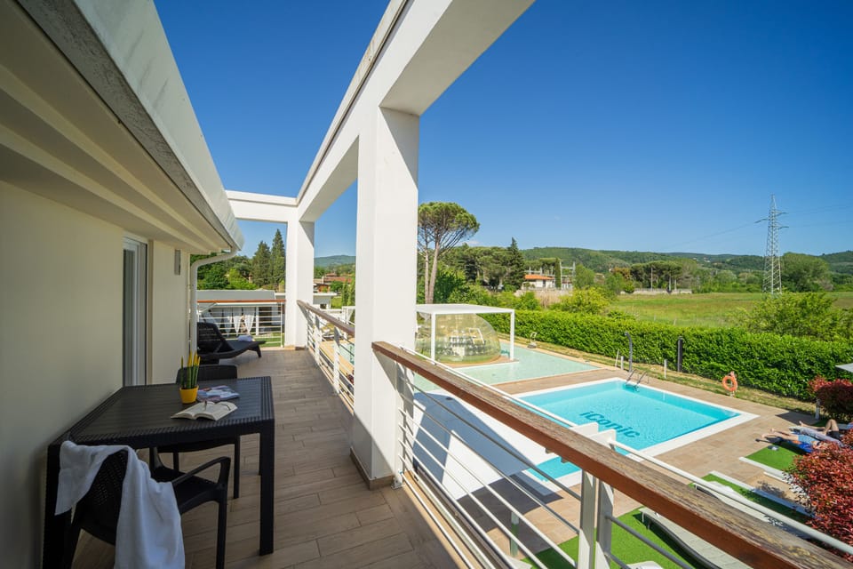 Deluxe Room, 1 King Bed, Balcony, Pool View | View from room