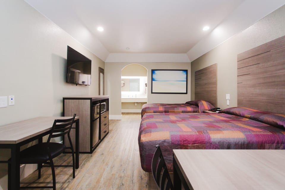 Exclusive Room, 2 Queen Beds, Non Smoking | Desk, free WiFi, bed sheets