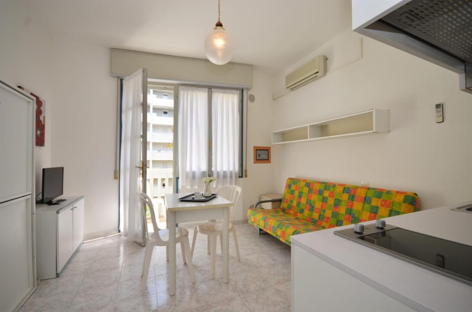 Classic Studio, Balcony | Living room | Flat-screen TV
