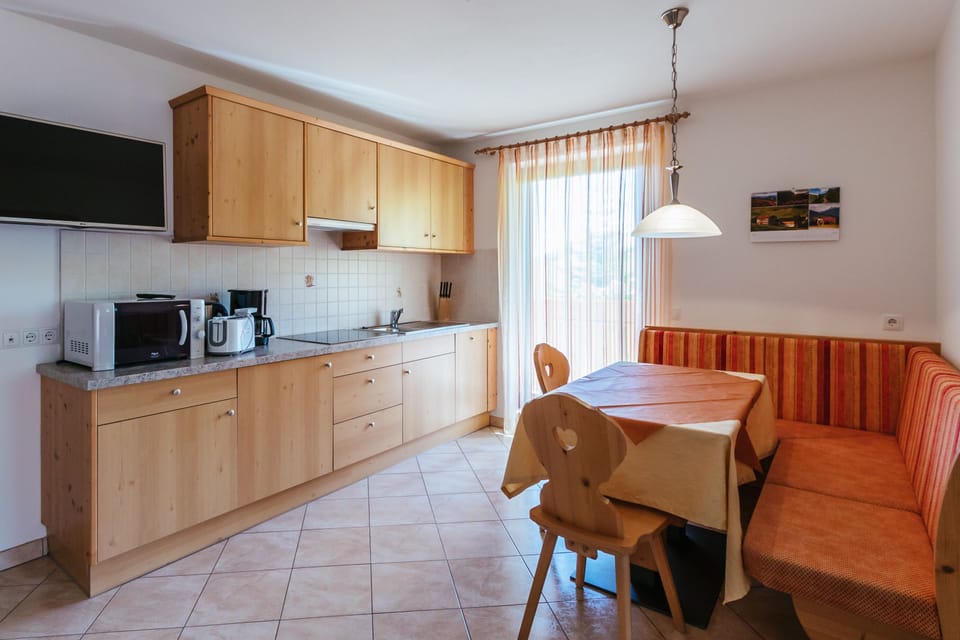 Apartment, 2 Bedrooms (B4) | Private kitchen | Full-size fridge, microwave, stovetop, dishwasher