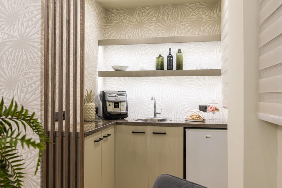 Apartment, Sea View | Private kitchen | Fridge, stovetop, electric kettle, toaster