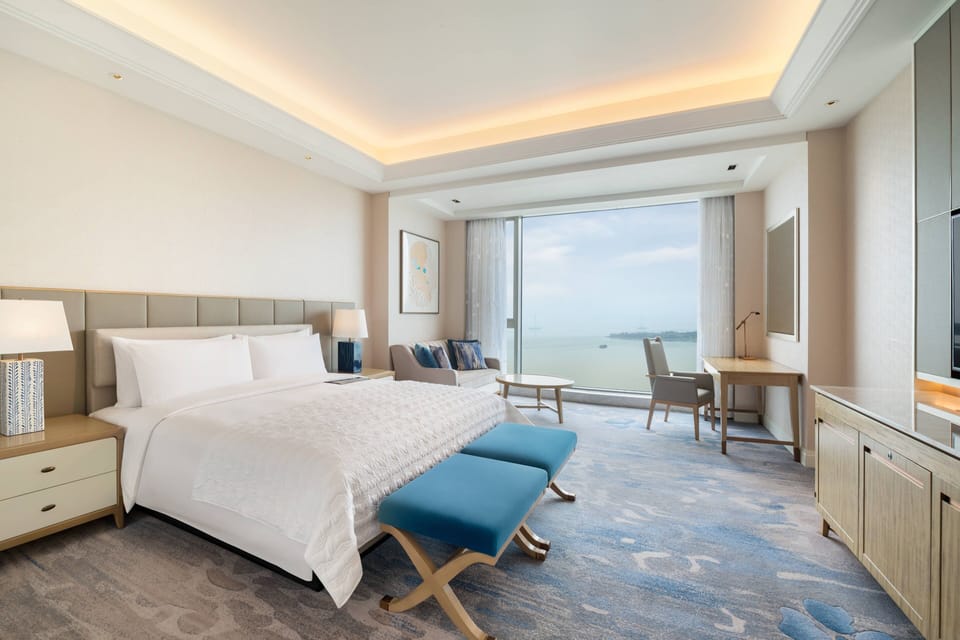 Premium bedding, down comforters, minibar, in-room safe