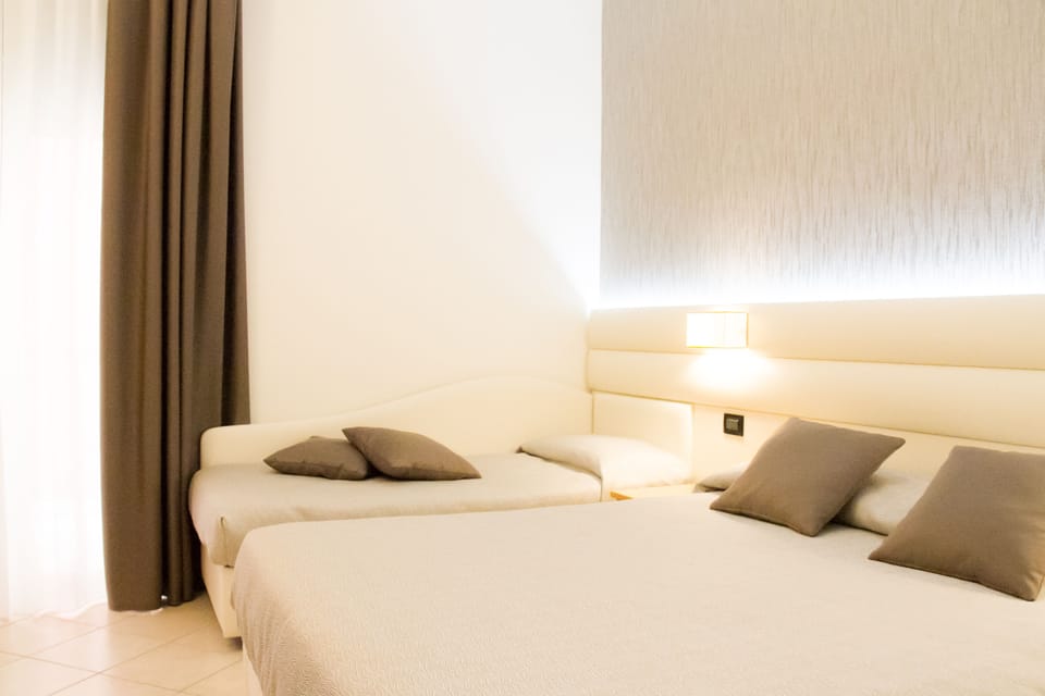 Standard Triple Room, Balcony | Premium bedding, minibar, in-room safe, desk