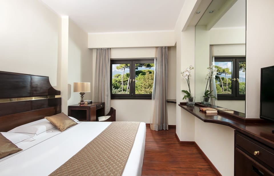 Premium bedding, memory foam beds, minibar, in-room safe