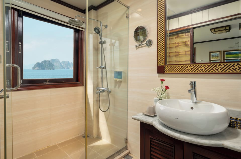 Shower, rainfall showerhead, free toiletries, hair dryer