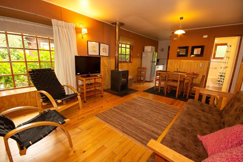 Cottage, 2 Bedrooms, Private Bathroom | Living area | 32-inch flat-screen TV with satellite channels, TV