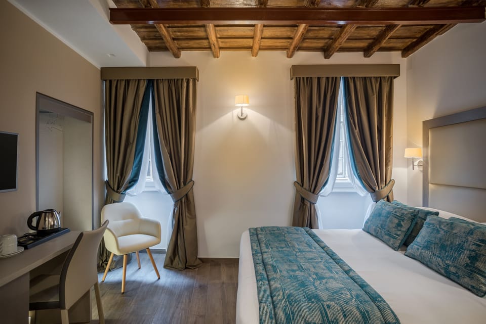 Superior Double Room | Minibar, in-room safe, desk, blackout drapes