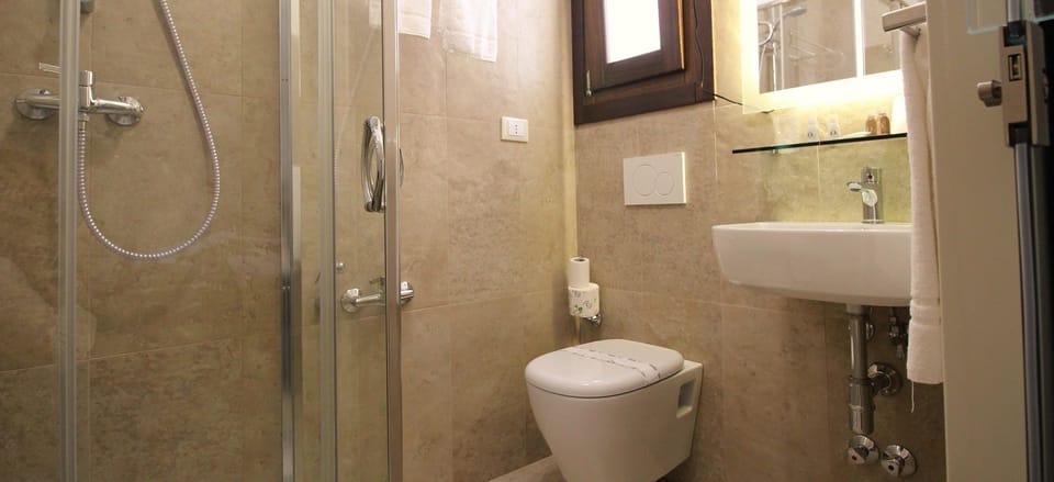 Economy Double Room (French bed ) | Bathroom | Shower, free toiletries, hair dryer, towels