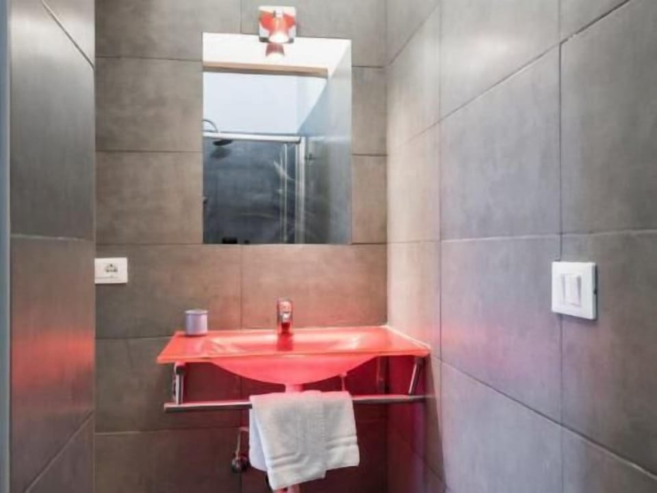 Shower, hair dryer, slippers, towels