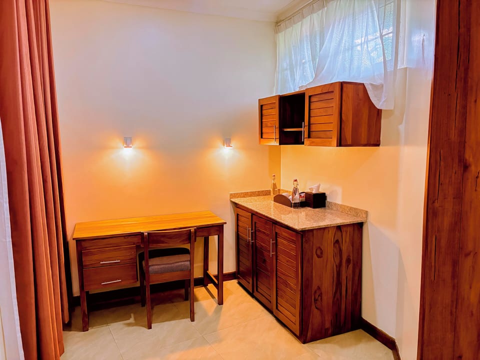 Executive Room | Living area | 32-inch LED TV with cable channels