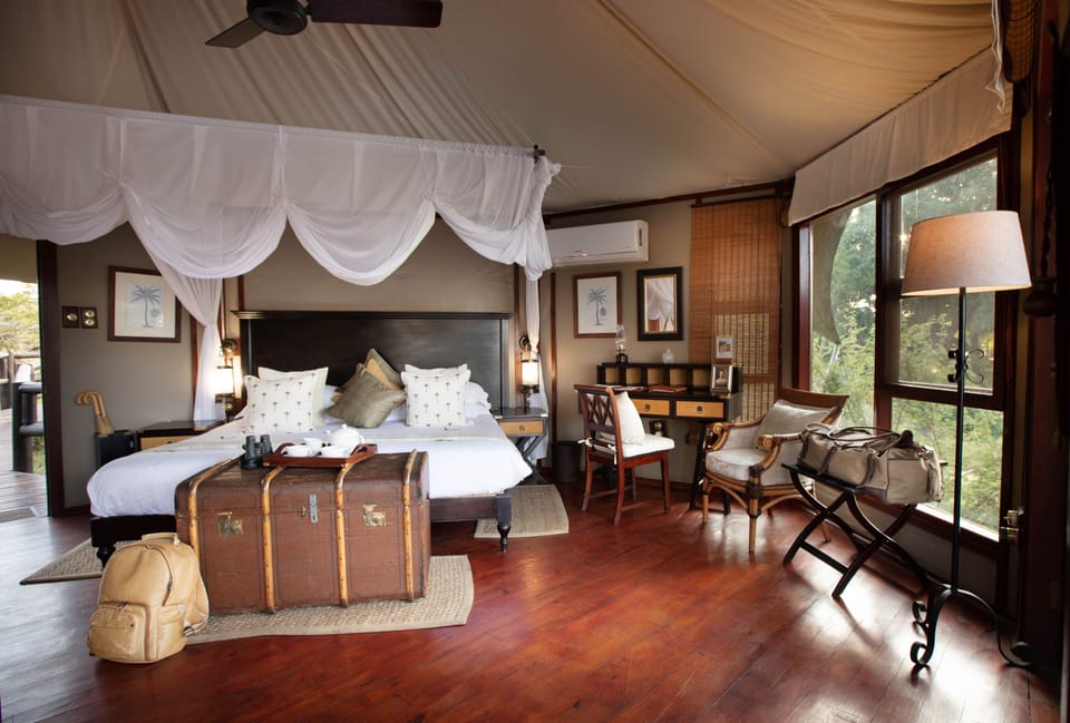 Suite | In-room safe, desk, bed sheets
