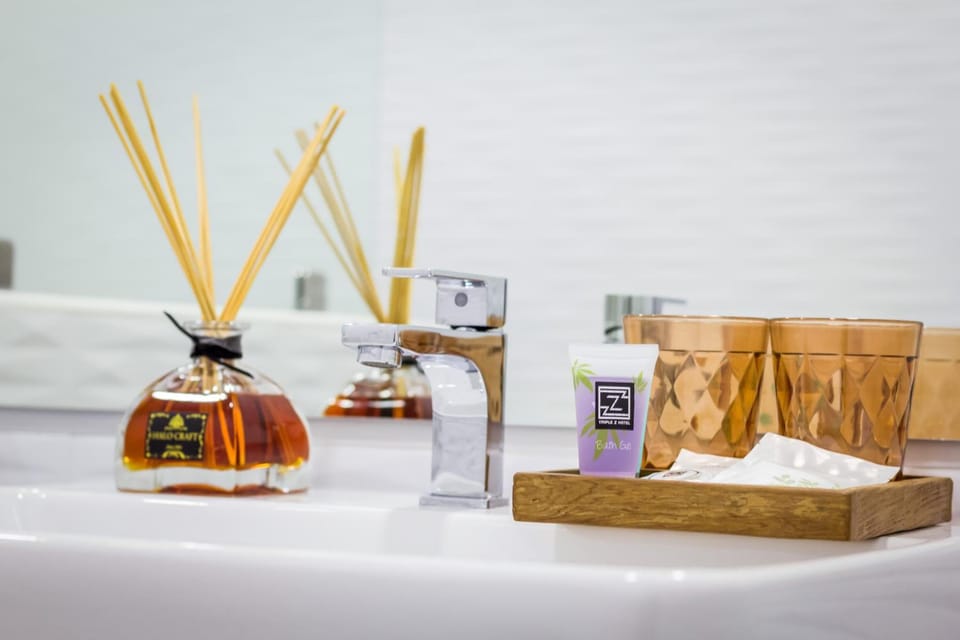 Shower, free toiletries, hair dryer, bathrobes