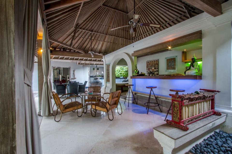 Superior Villa | Living area | Flat-screen TV, MP3 dock