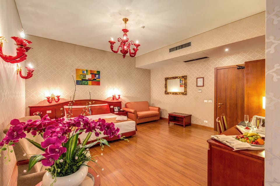 Quadruple Room | Premium bedding, minibar, in-room safe, individually furnished
