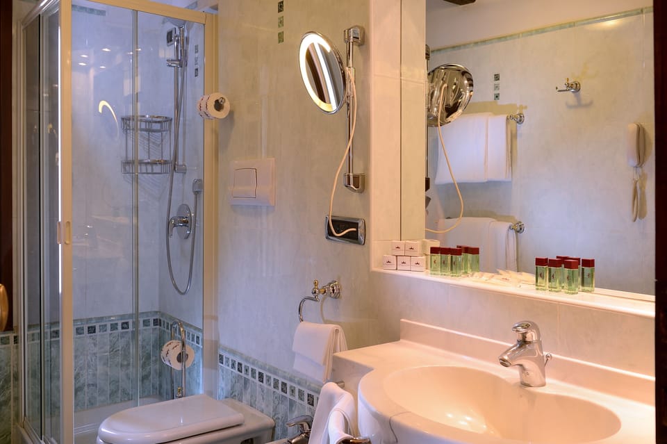 Rainfall showerhead, hair dryer, towels, soap
