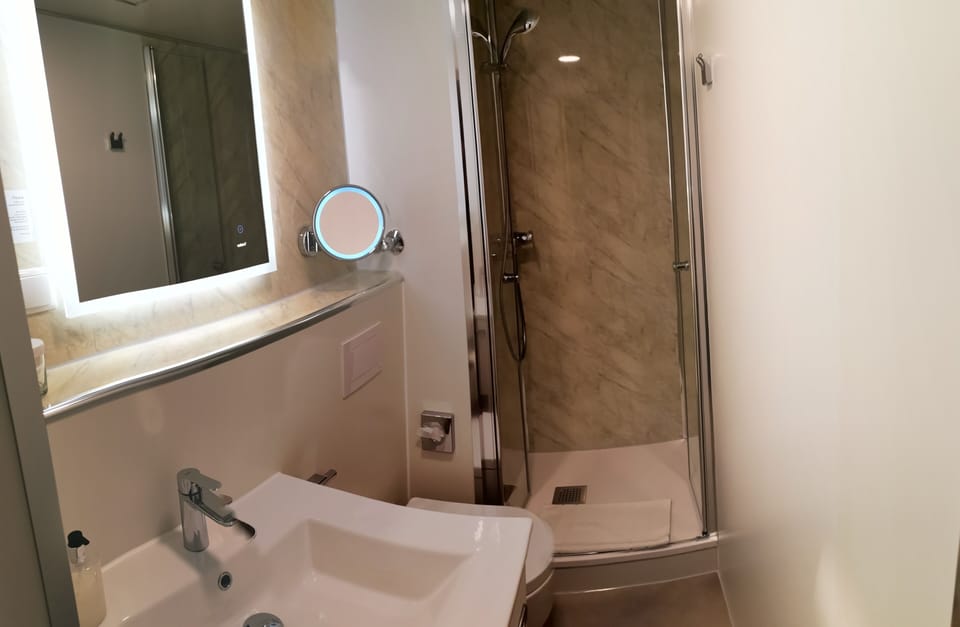 Shower, free toiletries, hair dryer, towels