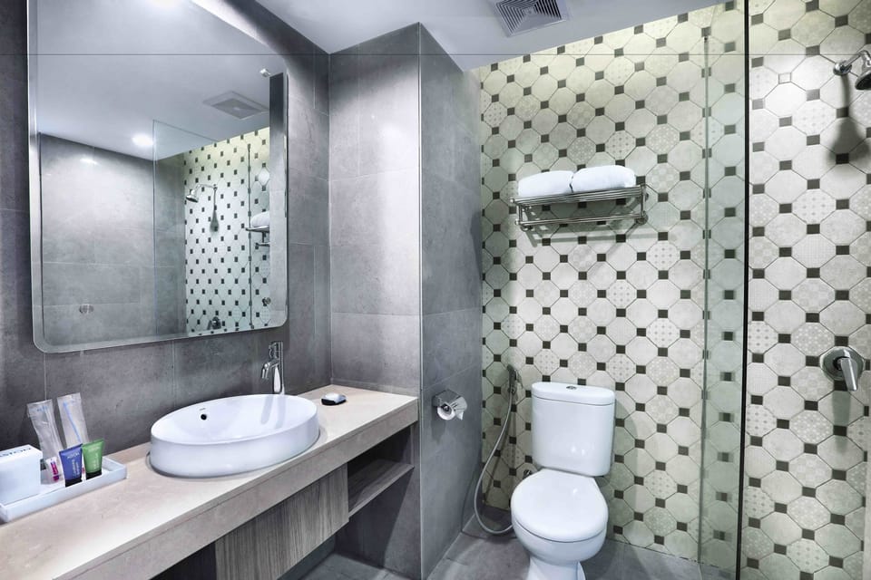 Shower, free toiletries, hair dryer, slippers
