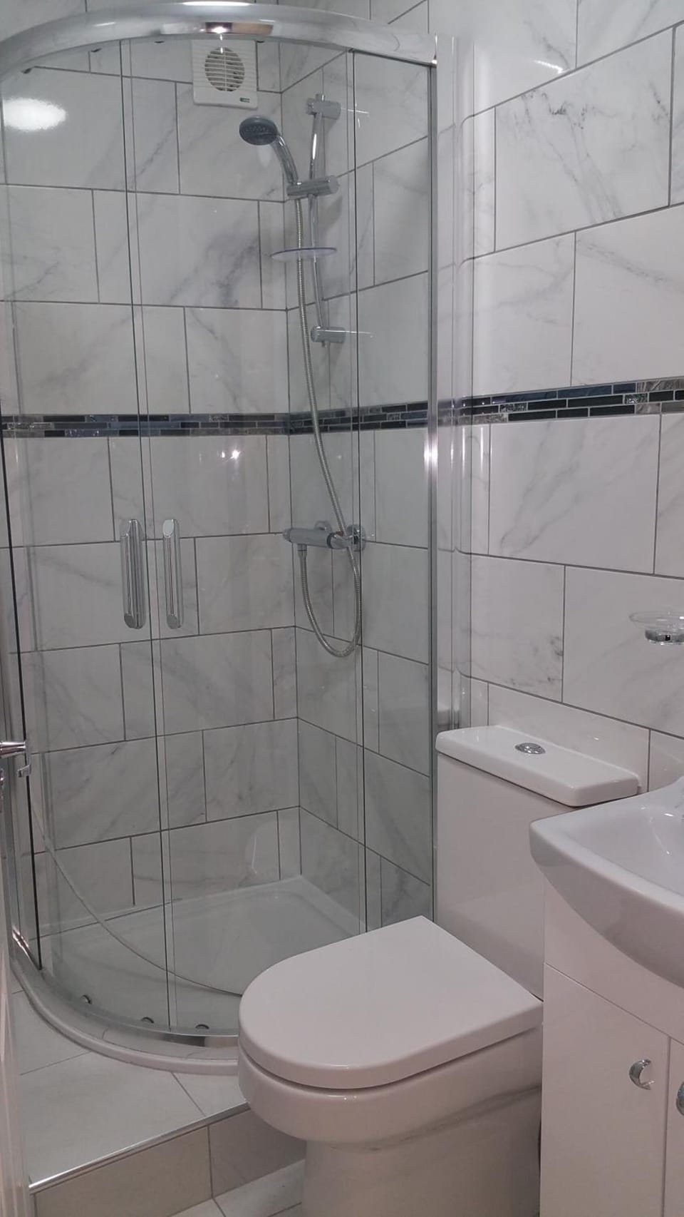 Shower, free toiletries, hair dryer, towels