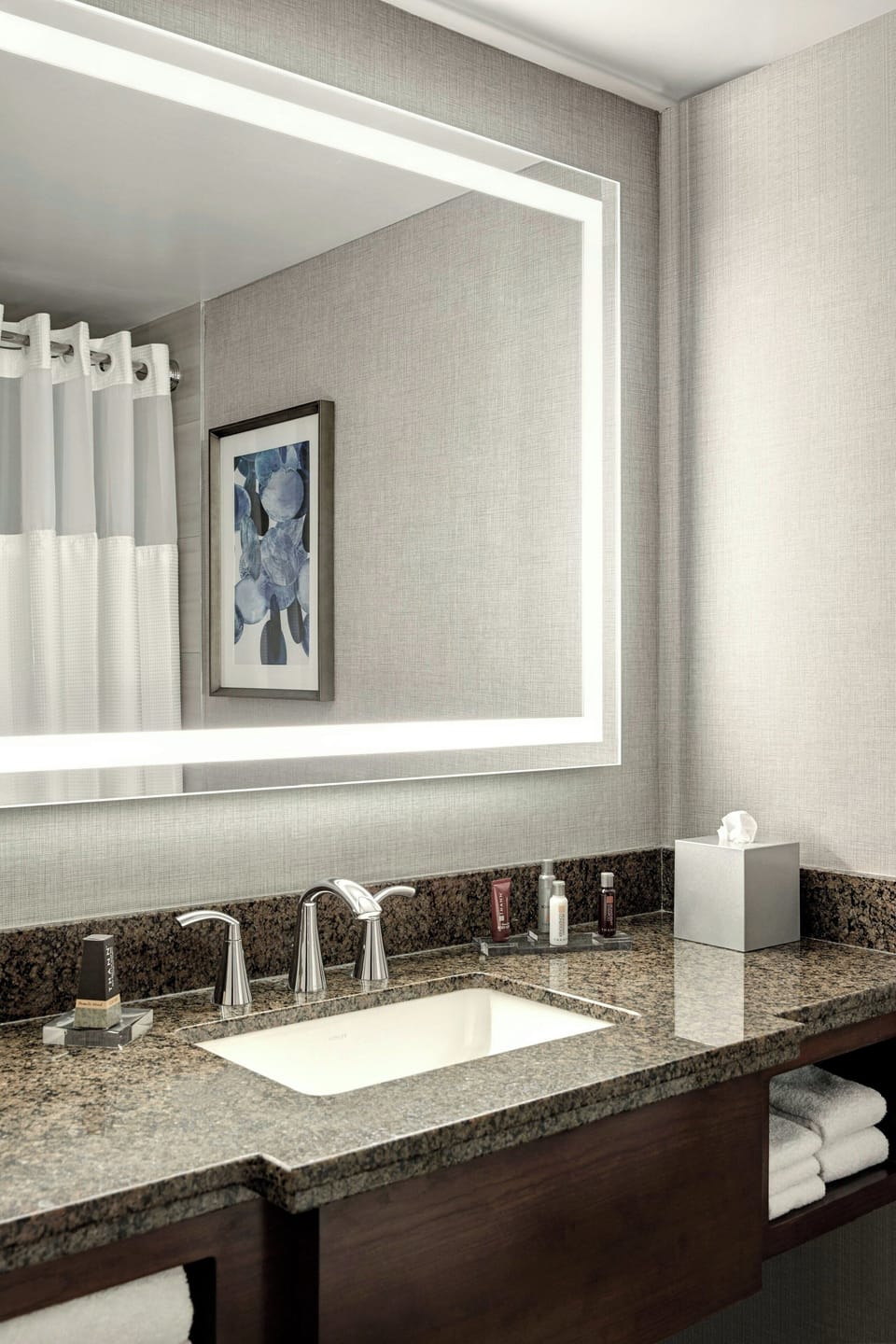 Combined shower/tub, designer toiletries, hair dryer, towels