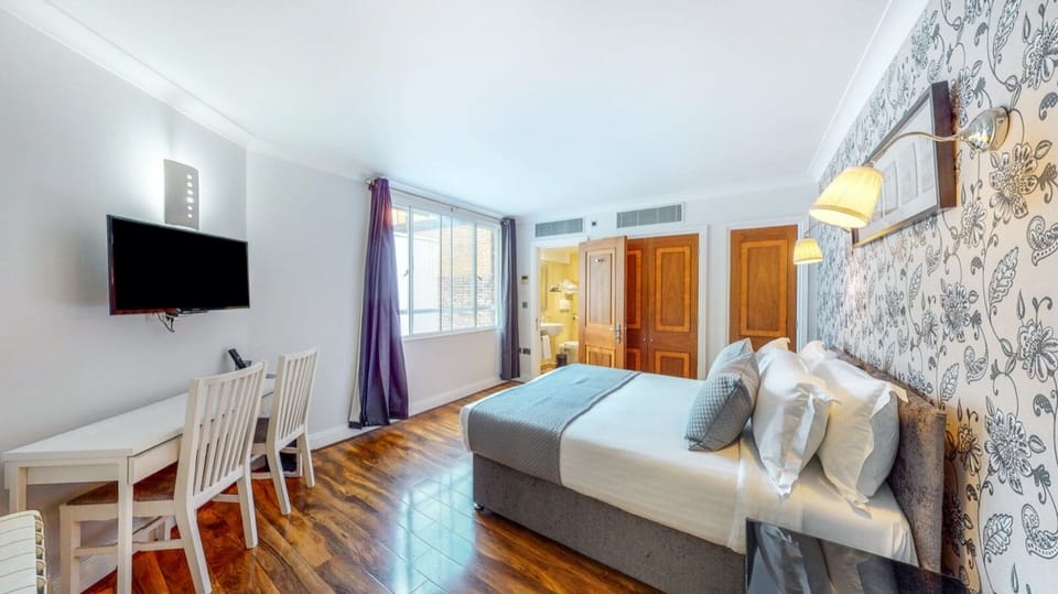 Iron/ironing board, cribs (free), WiFi (free), bed sheets