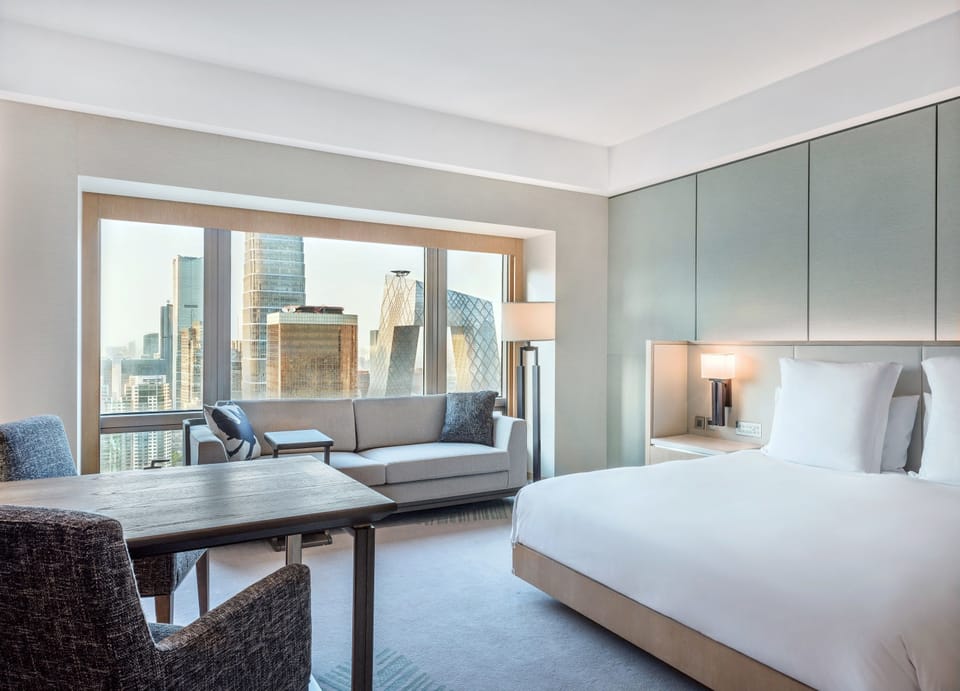 1 King Bed with CBD Tower View | Premium bedding, down comforters, minibar, in-room safe