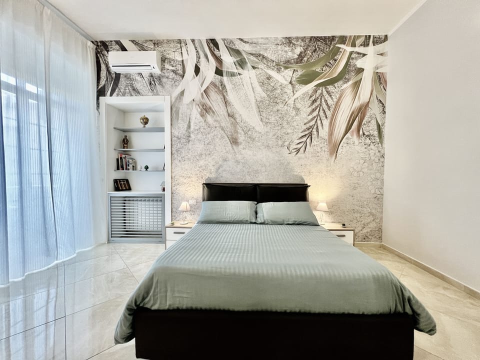 Deluxe Triple Room | Down comforters, memory foam beds, desk, blackout drapes