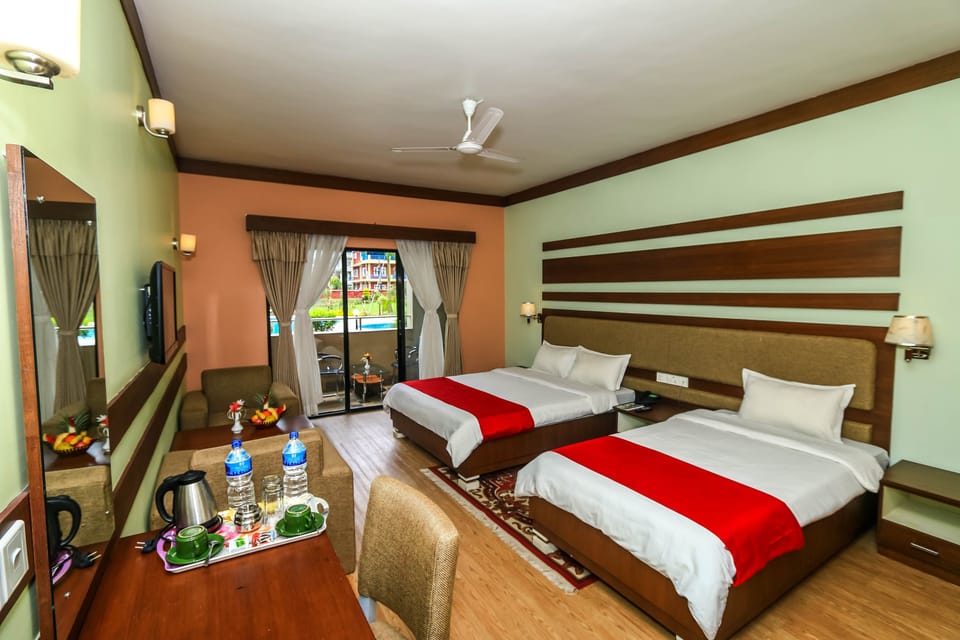 Deluxe Room | Minibar, desk, soundproofing, rollaway beds