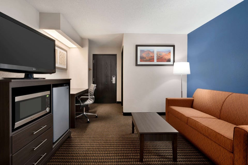 Suite, 1 Queen Bed, Non Smoking (Second Floor) | Desk, blackout drapes, iron/ironing board, free WiFi