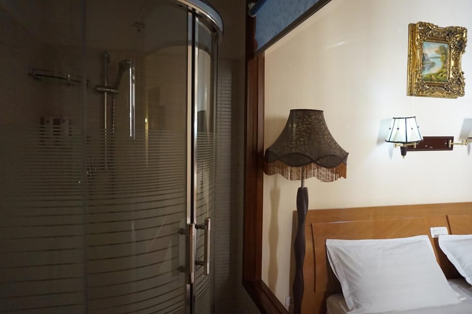Triple Room | Bathroom | Hair dryer, towels