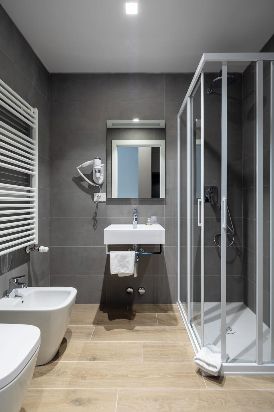 Shower, free toiletries, hair dryer, slippers