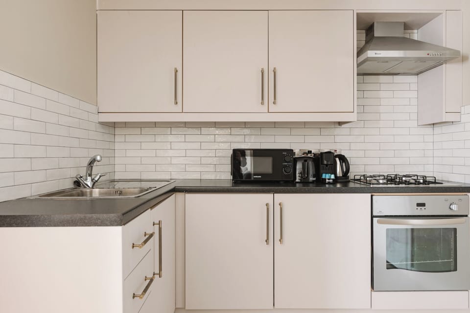 Residences One Bedroom Apartment (annex building) | Private kitchen | Highchair