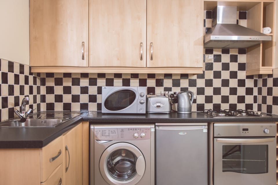 Residences One Bedroom Apartment (annex building) | Private kitchen | Highchair