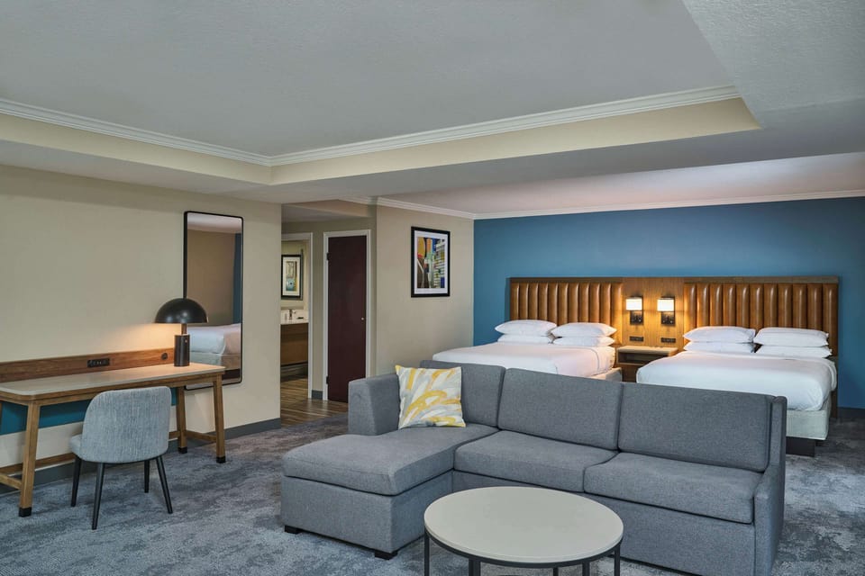 Junior Suite, 2 Queen Beds | Hypo-allergenic bedding, down comforters, in-room safe, desk