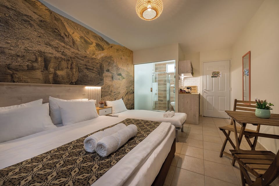 Double Room, Garden Area | Minibar, in-room safe, desk, blackout drapes