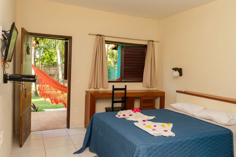 Basic Double Room | Premium bedding, minibar, blackout drapes, iron/ironing board